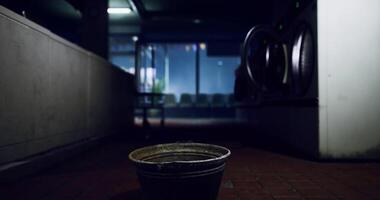 CGI Abandoned laundry space with a bucket on the floor at night video