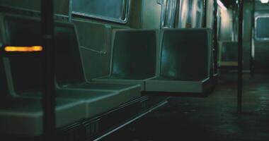 CGI Quiet subway interior during late hours with empty seats and dim lighting video