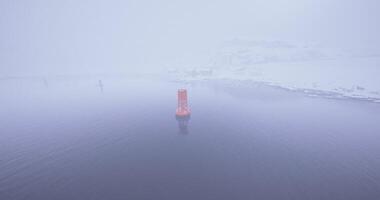 CGI Foggy winter view of navigational buoy in cold waters video