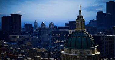 CGI Skyline view of urban architecture with dome under twilight sky video