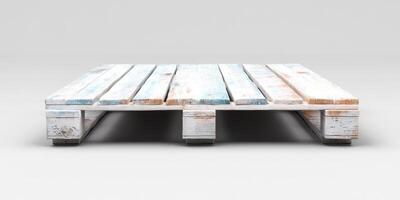 Wooden pallet resting on a smooth surface showcasing fading paint and weathered texture in a minimalistic indoor setting photo