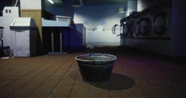 CGI Abandoned laundry room with a lonely bucket in the foreground video