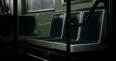 CGI Empty public transport seats in a dimly lit subway during early morning hours video
