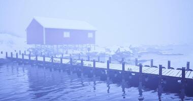 CGI Winter landscape featuring a red cabin and foggy dock by the water video