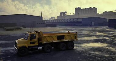 CGI Heavy machinery operates at industrial site during early morning light video