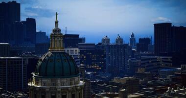 CGI City skyline with a historic dome at dusk in a busy urban area video