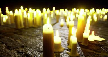 CGI Soft candlelight flickers in dimly lit space creating peaceful atmosphere video