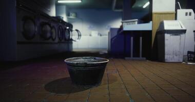 CGI Dark and quiet laundry room with an empty bucket on the floor video