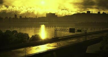 CGI Sunrise reflects on the river while city skyline outlines the horizon video