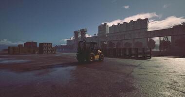 CGI Warehouse loading area with forklift at sunrise in industrial setting video