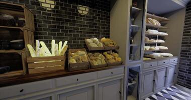 CGI Cozy bakery display of fresh breads and pastries video