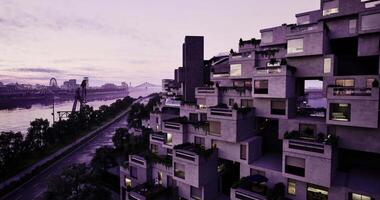 CGI Modern architecture along riverfront at dusk with urban landscape video