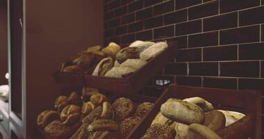 CGI Freshly baked artisan bread displays in a contemporary bakery setting video