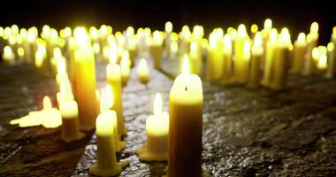 CGI Candles illuminate a dark space creating a serene atmosphere video