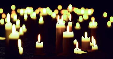 CGI Flickering candles illuminate a tranquil space during an evening gathering video