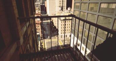 CGI View from a balcony overlooking a busy city street in urban setting video