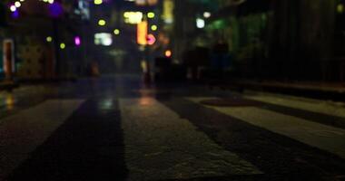 CGI Urban night scene with wet streets reflecting colorful lights in alleyway video