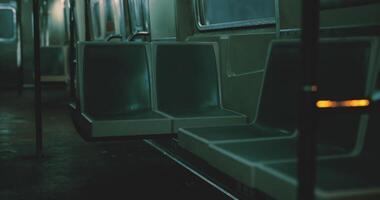 CGI Empty subway car at night with dim lighting and modern design features video
