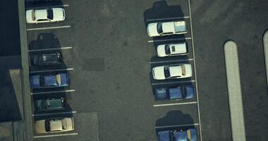 CGI Birds eye view of a parking lot with various cars in daytime video