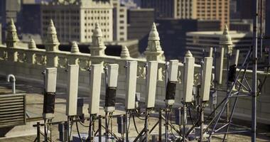 CGI Rooftop communication devices in an urban setting during daylight hours video