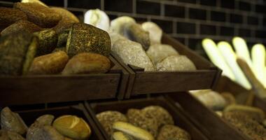 CGI Freshly baked artisan bread in a rustic bakery display during daytime video