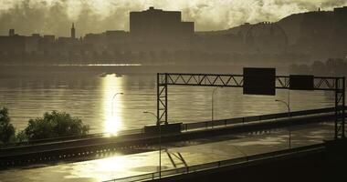 CGI Serene waterfront view at sunset with city skyline in the background video
