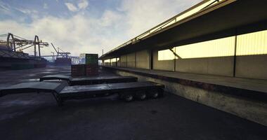 CGI Busy port area showcasing trailers parked for loading in early morning light video