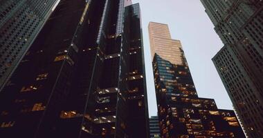 CGI View of modern skyscrapers at dusk in an urban city center video