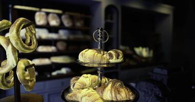 CGI Display of freshly baked pastries in a cozy bakery setting video