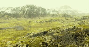 CGI Vast mountainous landscape with rocky terrain and distant peaks under pale sky video