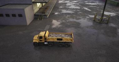 CGI A yellow dump truck is driving on a wet surface in an industrial setting video