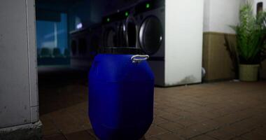 CGI Container placed near laundry machines in a quiet laundromat video
