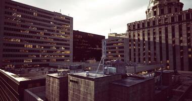 CGI Urban skyline at dusk showcasing towering buildings and rooftop structures video