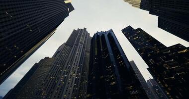 CGI City skyline captured from below during twilight with glowing windows video