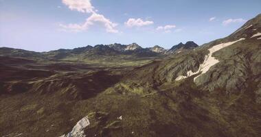 CGI Expansive view of rugged mountains and valleys under a clear blue sky video
