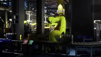 CGI Robotic arm working on assembly line in modern factory setup video