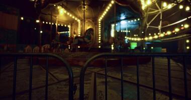CGI Abandoned carousel surrounded by mysterious lights at night video