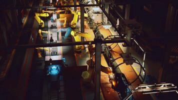 CGI Robotics operate efficiently in a manufacturing facility during nighttime video