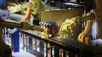 CGI Industrial robots assembling components in a high tech manufacturing facility video
