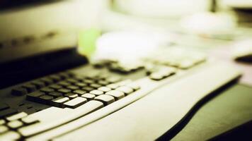 CGI Keyboard and workspace setup highlighting technology in a dimly lit environment video