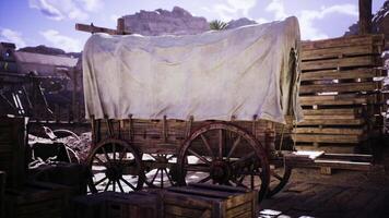 CGI Wooden wagon covered with cloth in a rustic outdoor setting video