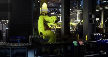 CGI Robotic arm assembling products in a modern factory environment video