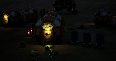 CGI Exploration habitat on Mars illuminated at night with storage units nearby video