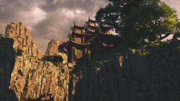 CGI Ancient temple nestled in rocky mountains of China at dusk video