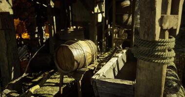 CGI Rustic wooden barrel and empty trough inside a farm shed video
