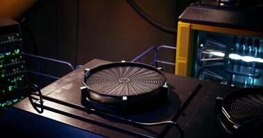 CGI High tech device on futuristic work surface with equipment in background video