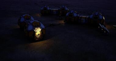 CGI Mars habitat modules illuminated at night with a view of the Martian landscape video