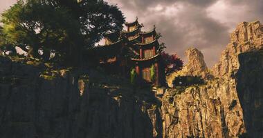 CGI Scenic mountain temple against dramatic sky in remote China video