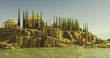 CGI Historic architecture atop rocky cliffs by calm waters in golden hour light video
