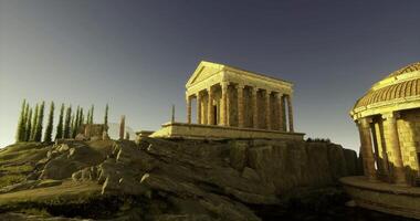 CGI Historic temple ruins on rocky terrain with clear blue sky during sunset video